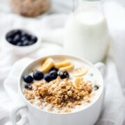 Granola With Milk And Fruits In Bowl For Breakfast