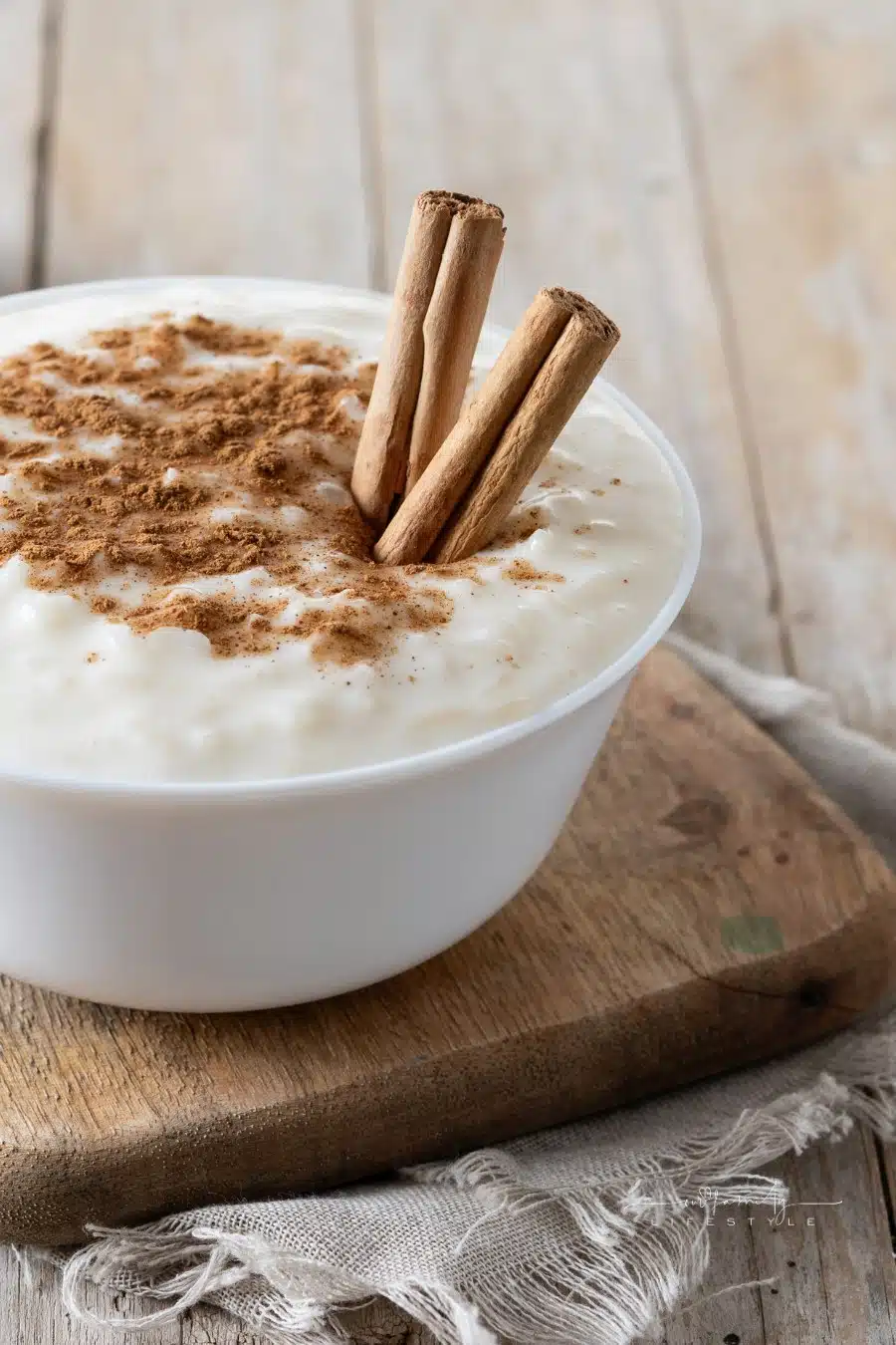 Arroz con Leche with cinnamon sticks