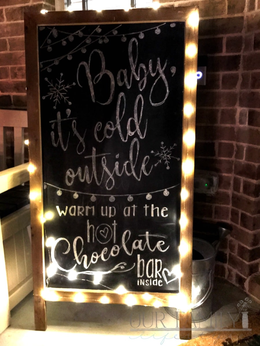 hot chocolate bar inside chalkboard sign