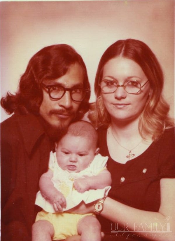 mom and dad with me as a baby