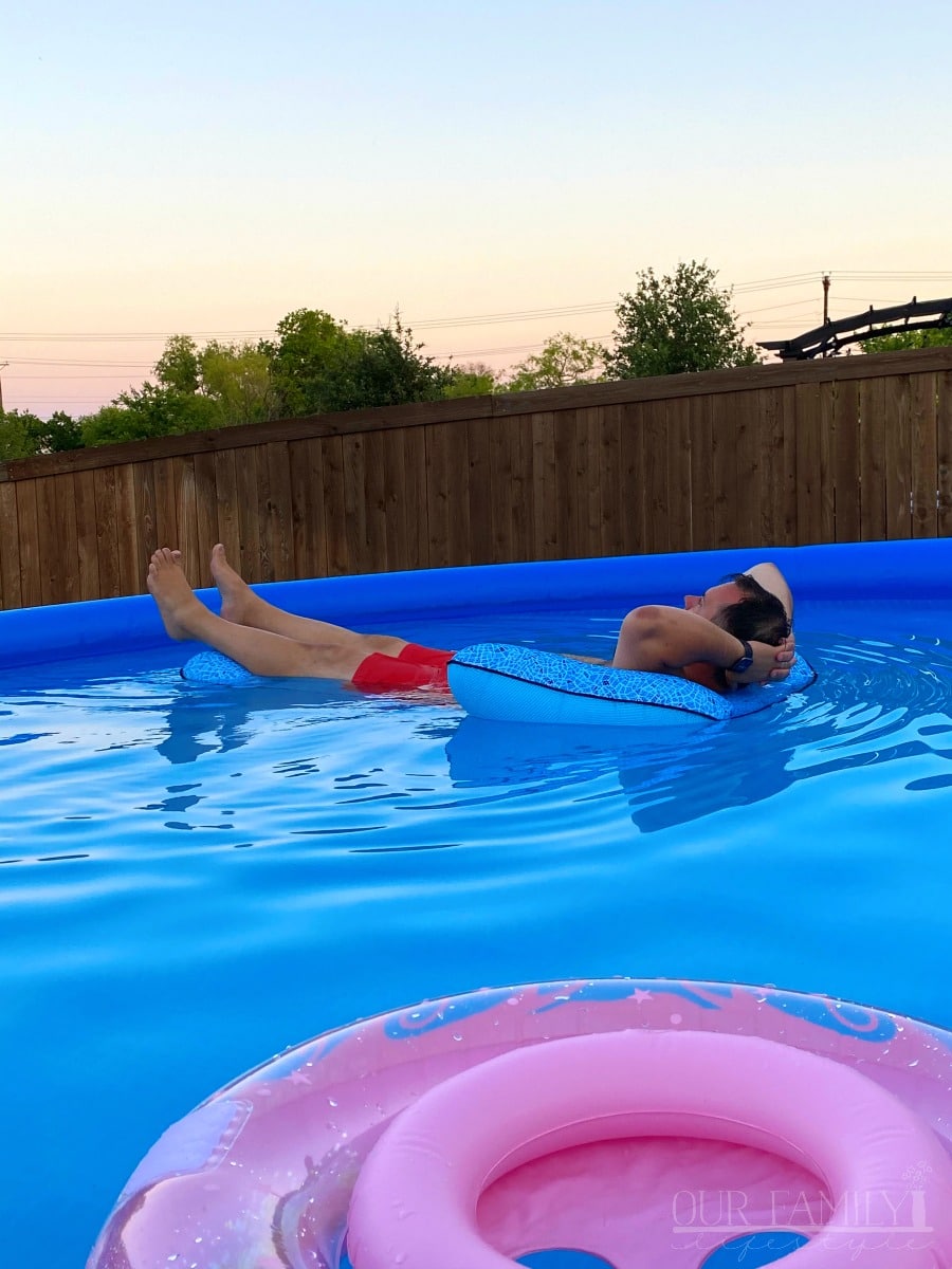 Colby enjoying his pool at dusk