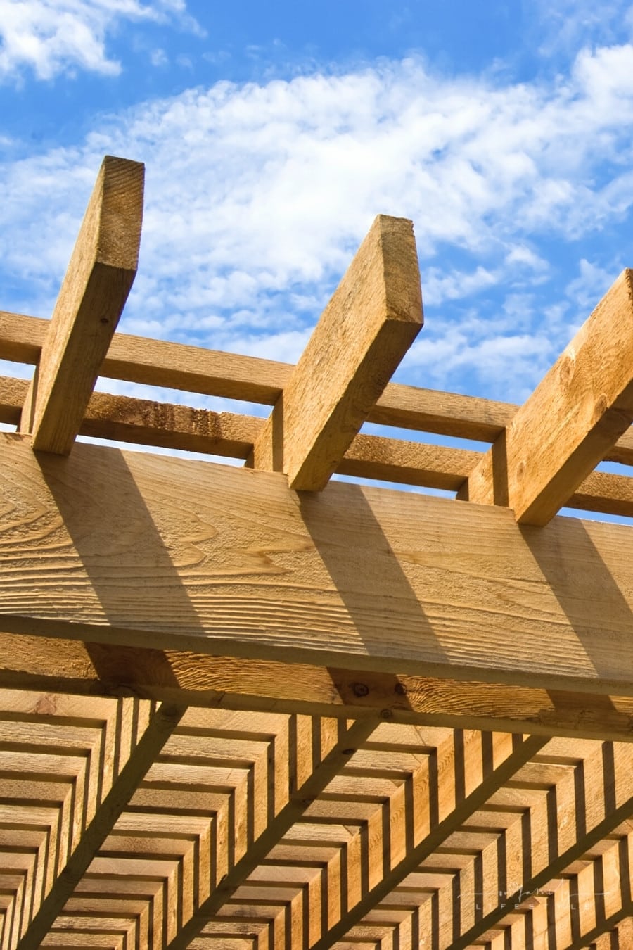 How to Anchor a Pergola to a House