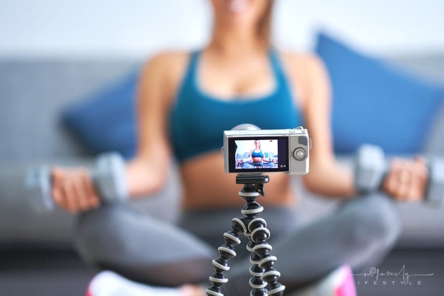 fitness vlogger filming youtube vide