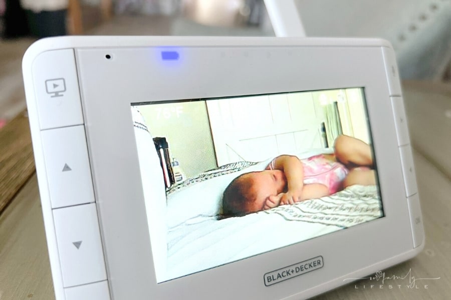 toddler sleeping shown on video monitor