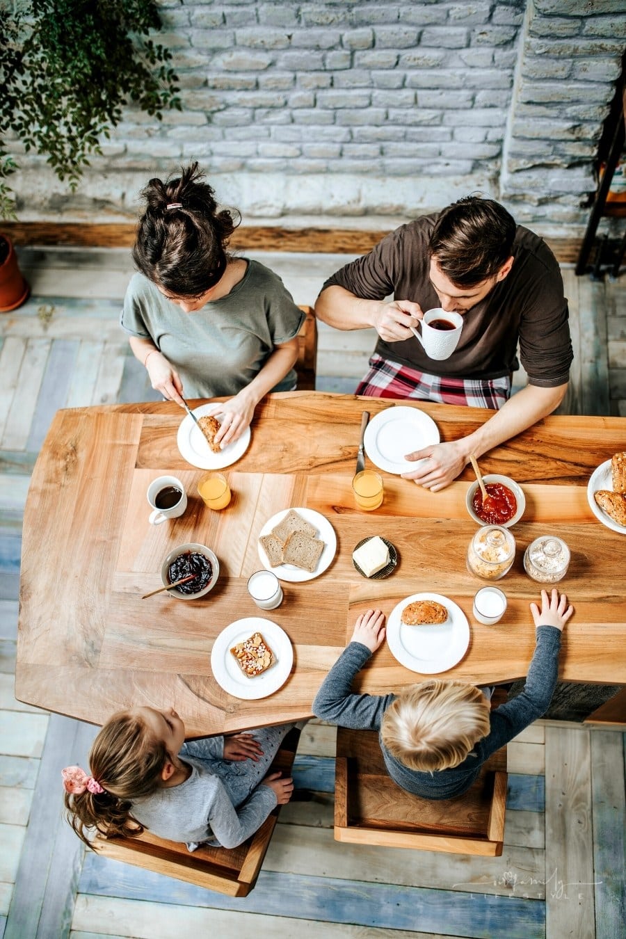 young family enjoying meal together