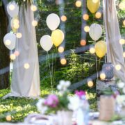 summer party set up with hanging jars and party balloons