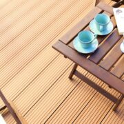 close up overhead view of wooden deck and chairs
