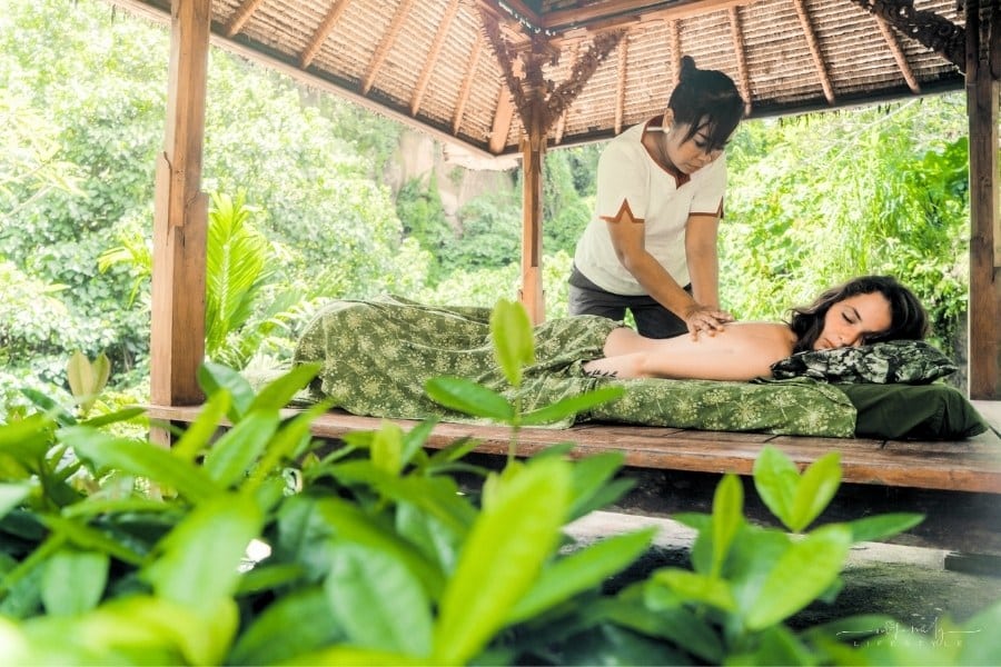 woman getting a massage outdoors in Bali