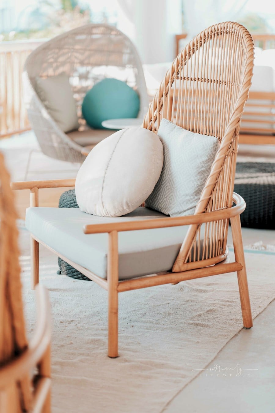 Wicker Armchair With Pillows on outdoor patio