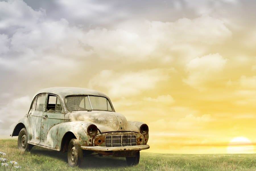 An Old Car with Misty Sunrise, Sunset. - A manipulated photograph with some illustration elements.