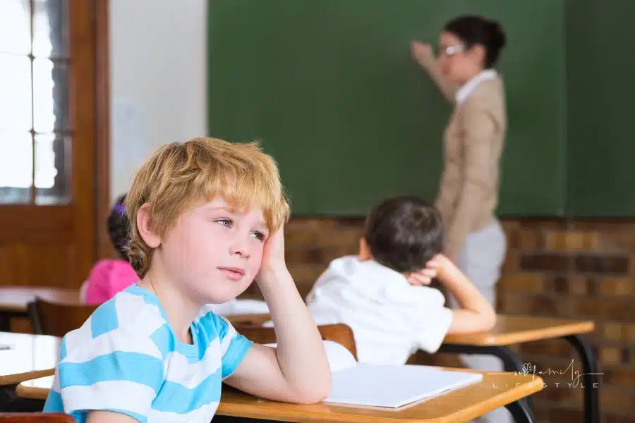 young student not paying attention in classroom