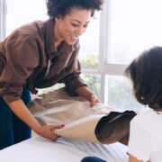 mother and daughter unpacking after a move