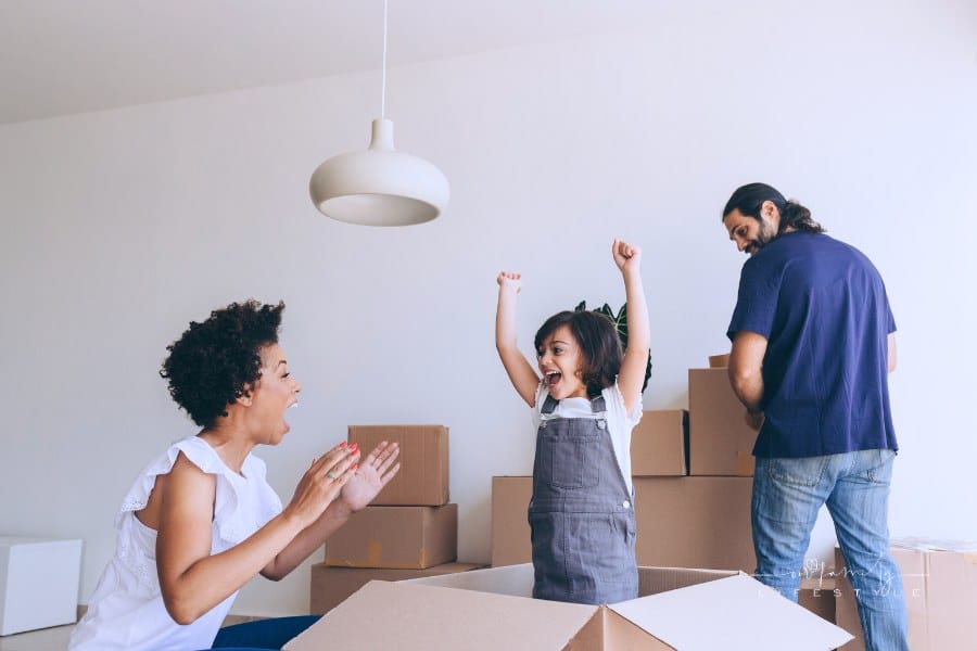 Family Unpacking Boxes after move