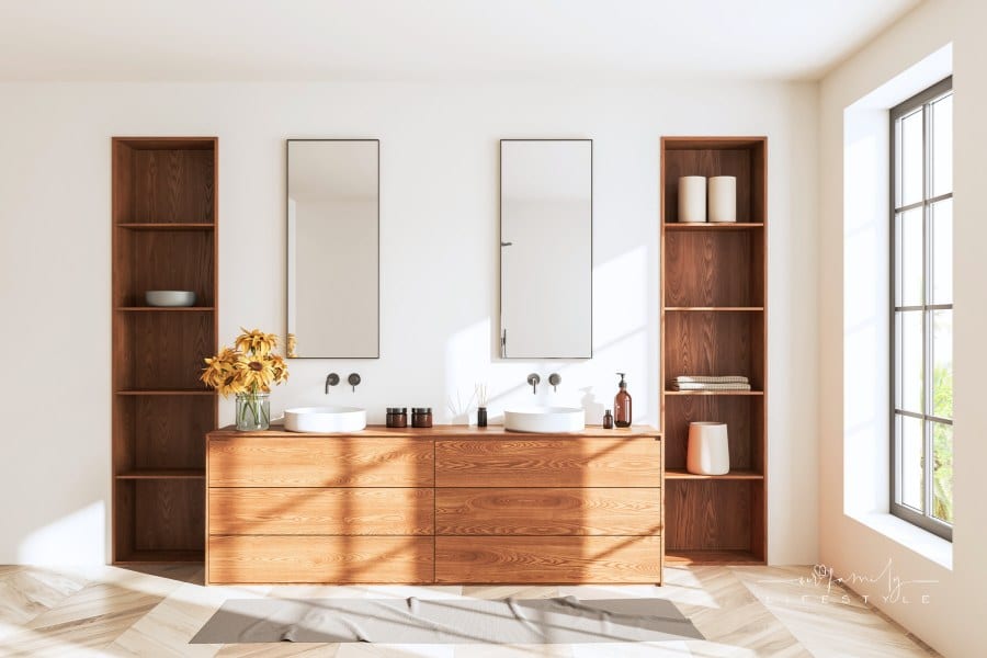 White bathroom interior with mid-century style double vanity sink