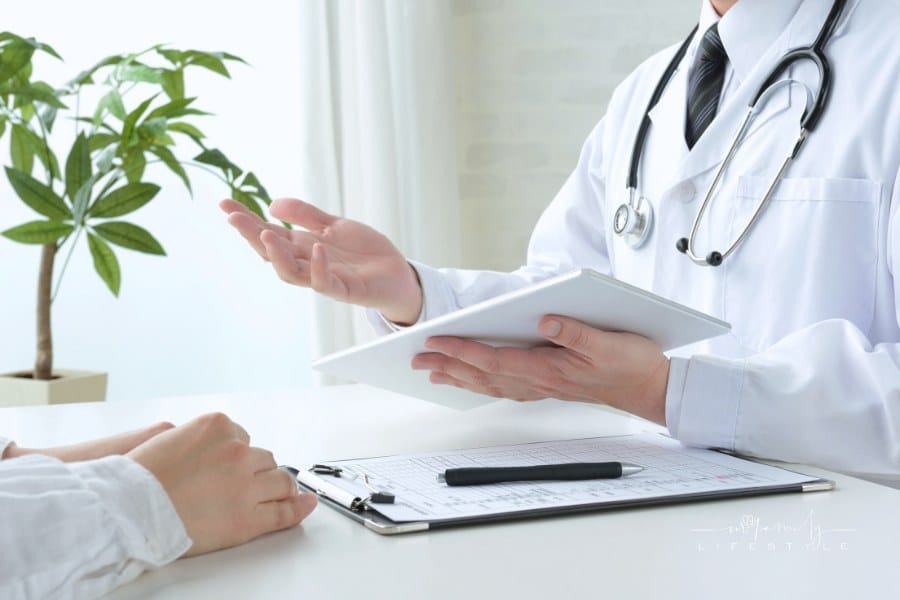 Doctor and patient in medical consultation room