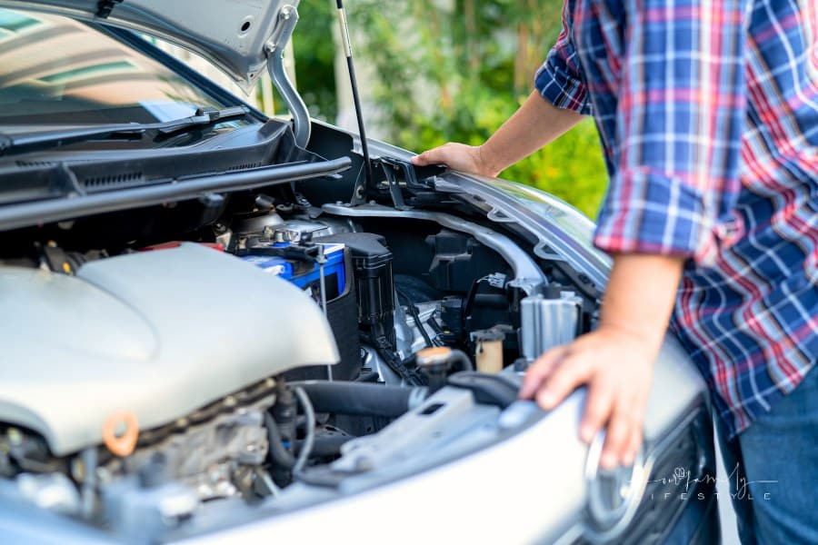 Open Hood Mechanic Engine System to Check and Repair Damage Car