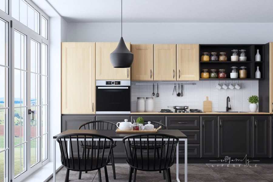 Modern Scandinavian kitchen and dining room with matte light and dark wood black shaker design cabinets